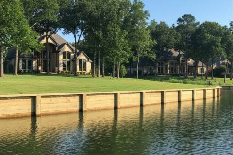 new wooden bulkhead at luxury lakefront community