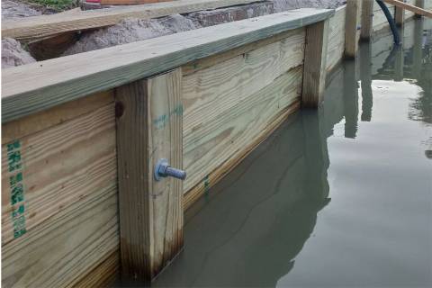 wooden bulkhead construction detail with bolts