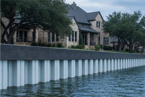 vinyl bulkhead with composite cap protection