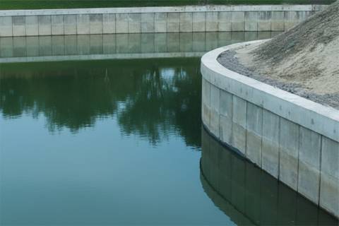 curved concrete seawall protection