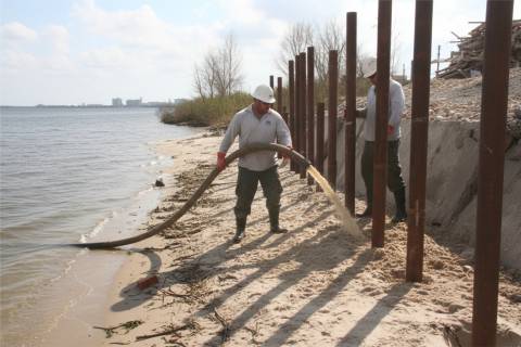 piling installation pile driver wooden piles waterfront construction
