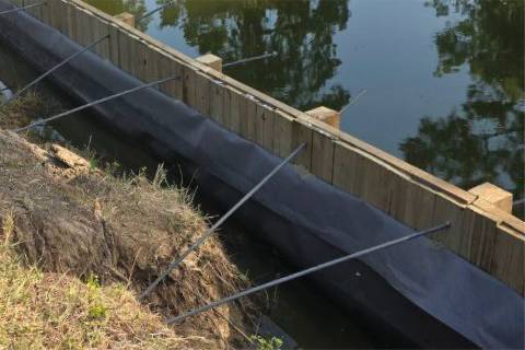 shoreline stabilization bulkhead repair anchoring system waterfront maintenance piling