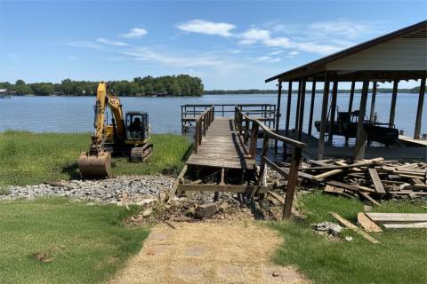 waterfront demolition pier removal shoreline maintenance excavator project