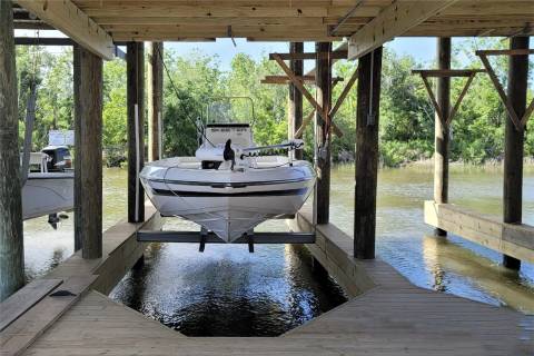 covered boat dock lift piles