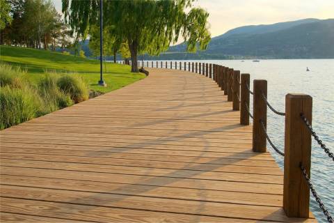 wooden boardwalk chain railing waterfront