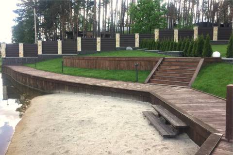 wooden boardwalk beach access retaining wall landscaping