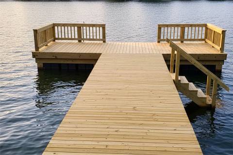 wooden pier t-shape railing stairs