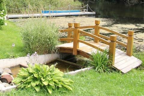 wooden bridge arched bridge garden landscaping